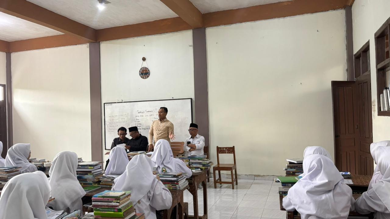 Mengajar